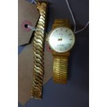 A 9ct gold cased Ingersoll quartz watch on a gold plated strap together with a gold plated bracelet