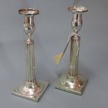 A pair of Continental hallmarked silver candlesticks H 25 x W 9 x 9cm