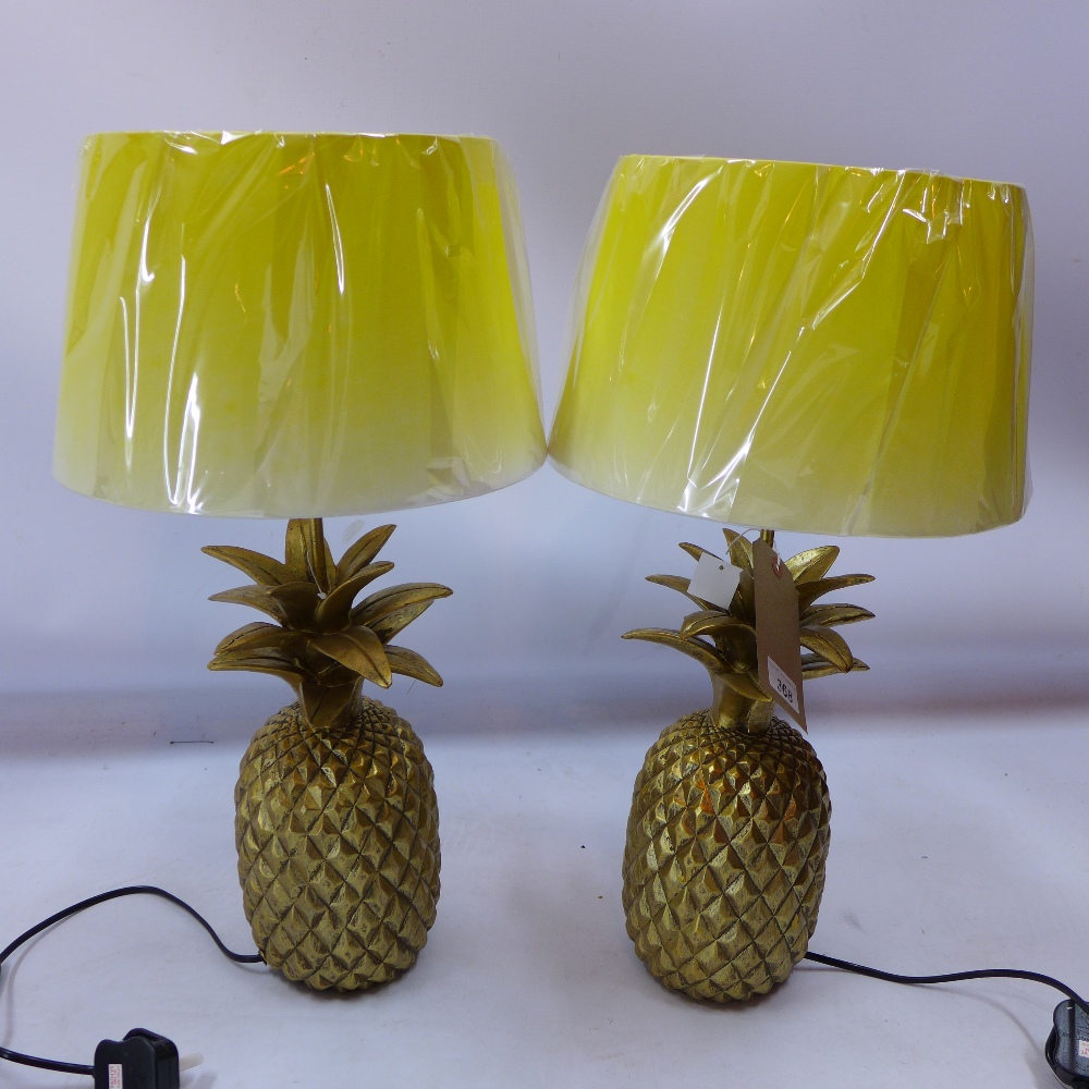 A pair of contemporary table lamps in the form of gilt pineapples H 40cm