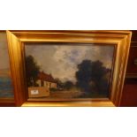 An early 20th century central European oil on canvas landscape depicting a path running by a