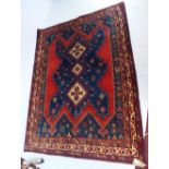 A fine north west Persian Afshar rug 213 x 160cm with triple pole medallion on a sapphire field