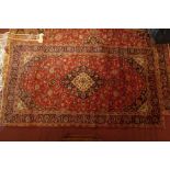 A fine central Persian Kashan carpet 270 x 150cm central pendent medallion with repeating petal