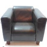 A brown leather Art Deco style armchair