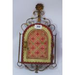 A brass Arts and Crafts style key holder