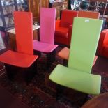 A set of four contemporary dining chairs