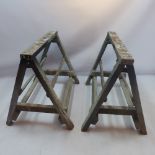 A pair of grey painted tressle bases, H