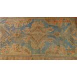 An antique Persian rug with central medallion contained by borders 203 x 124cm