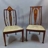 Two Art Nouveau mahogany chairs having inlaid detail to the backs