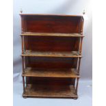 A 19th century simulated rosewood five tier waterfall bookcase raised on turned column supports and