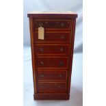 A 20th century mahogany Wellington chest of six drawers and painted with classical swags and