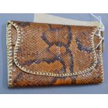 A vintage snakeskin purse 9 x 15cm