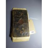 A Safavid Persian leather bound hand written and hand illustrated book,