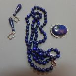 A Lapiz Lazuli suite comprising of a necklace brooch and earrings