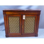 A 19th century rosewood chiffonier with single drawer above two cupboard doors and raised on square