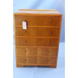 An oak chest of five long drawers H 100 x W 74 x D 41cm