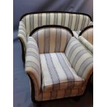 A French Art Deco three piece suite upholstered in ivory fabric,