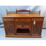 A Victorian mahogany sideboard with three drawers above two central doors flanked by two bigger