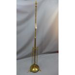 An Arts and Crafts extending brass standard lamp 190cm highly fully extended