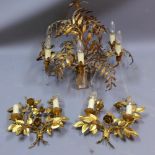 A gilt metal chandelier with leaf decoration together with a pair of matching wall lights