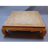 A Chinese hardwood low table of square form H 40 x W 130 x D 130cm