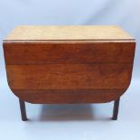 A 19th century oak Pembroke table with single end drawer and raised on square legs,