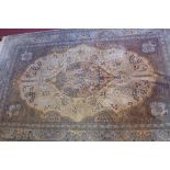 A Persian part silk rug with central medallion surrounded by may borders and on a cream ground 226