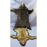 An antique taxidermy bearskin, possibly Van Ingen, together with another similar,