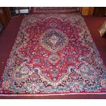 A signed Meshad carpet 350 x 255cm,