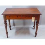 A Victorian mahogany side table having two short drawers and raised on turned supports H 73 x W 91