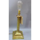 A brass Doric column design table lamp H 55 with bulb