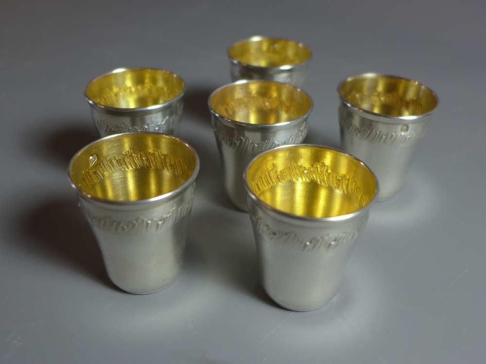 A set of six sterling silver French goblets with gilt interior.