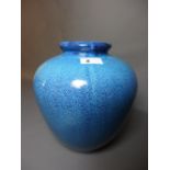 A Studio pottery vase of squat baluster from having a mottled blue grazed.