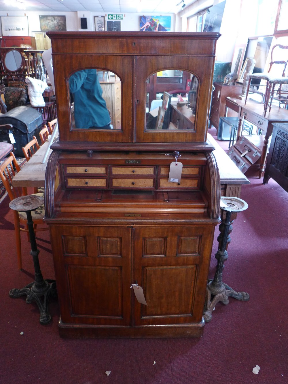 A 19th Century mahogany roll top secretaire cabinet,