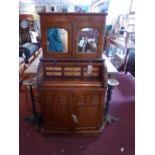 A 19th Century mahogany roll top secretaire cabinet,