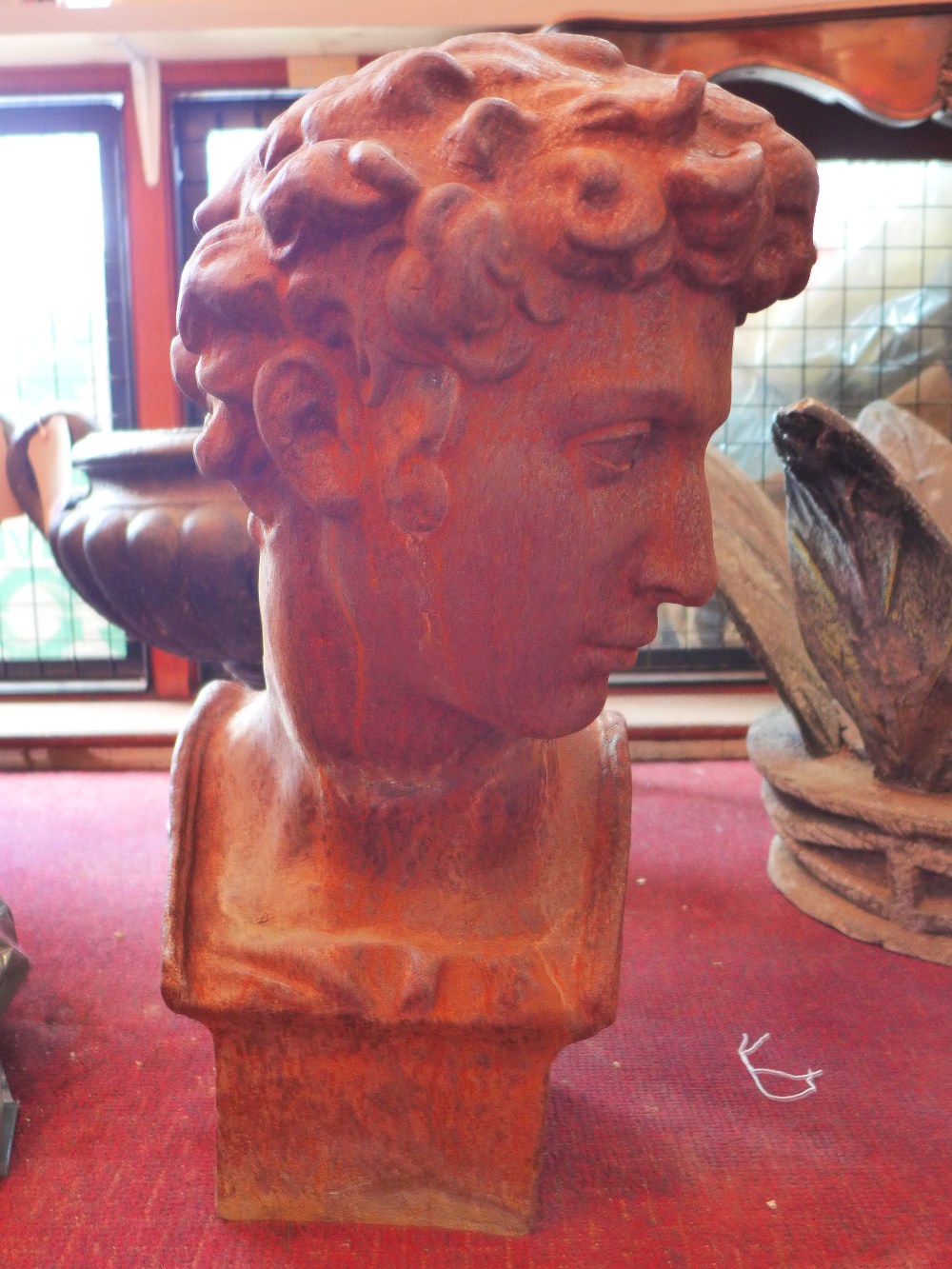 An early 20th century cast iron bust of David.