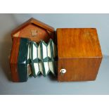 A 19th Century Lachenal concertina in original mahogany case.