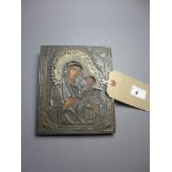 A Russian hallmarked silver orthodox icon, stamped '84', depicting Madonna and child.