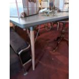 A large grey painted dining table of rectangular form raised on tapering supports H:76cm W:200cm