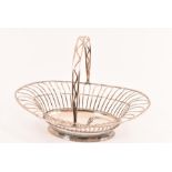 A good and large 18th Century Old Sheffield Plate swing handled basket of oval form standing on