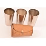 A set of three silver plated travelling beakers in leather case, Height 12cm x Width 7cm