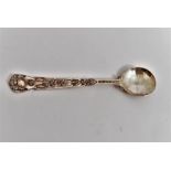 A 19th Century silver plated serving spoon, the handle decorated with scrolling shell work designs