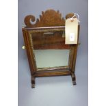 An 18th Century mahogany swing framed to