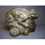 An unusual stone carving of a chameleon