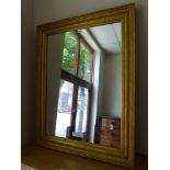 A Mid 20th Century gilt framed mirror wi