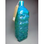 A 1970's M'dina aquamarine glass vase with bark effect and designed by Michael Harris.