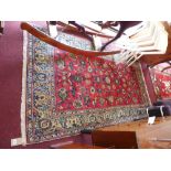An central Persian Isfahan rug, 243cm x 135cm,