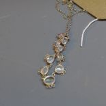 A sliver and moonstone necklace