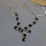 A silver and onyx necklace