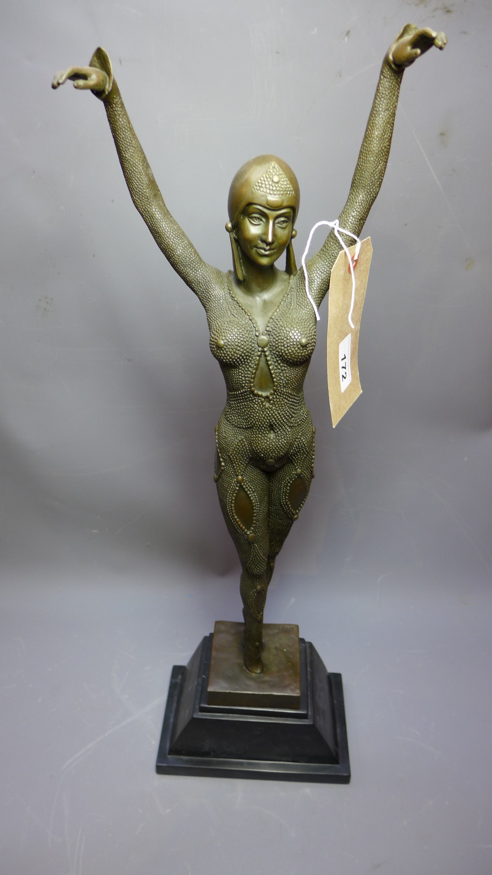 An Art Deco style bronze figure of a lad