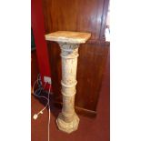 A marble jardiniere stand of column form